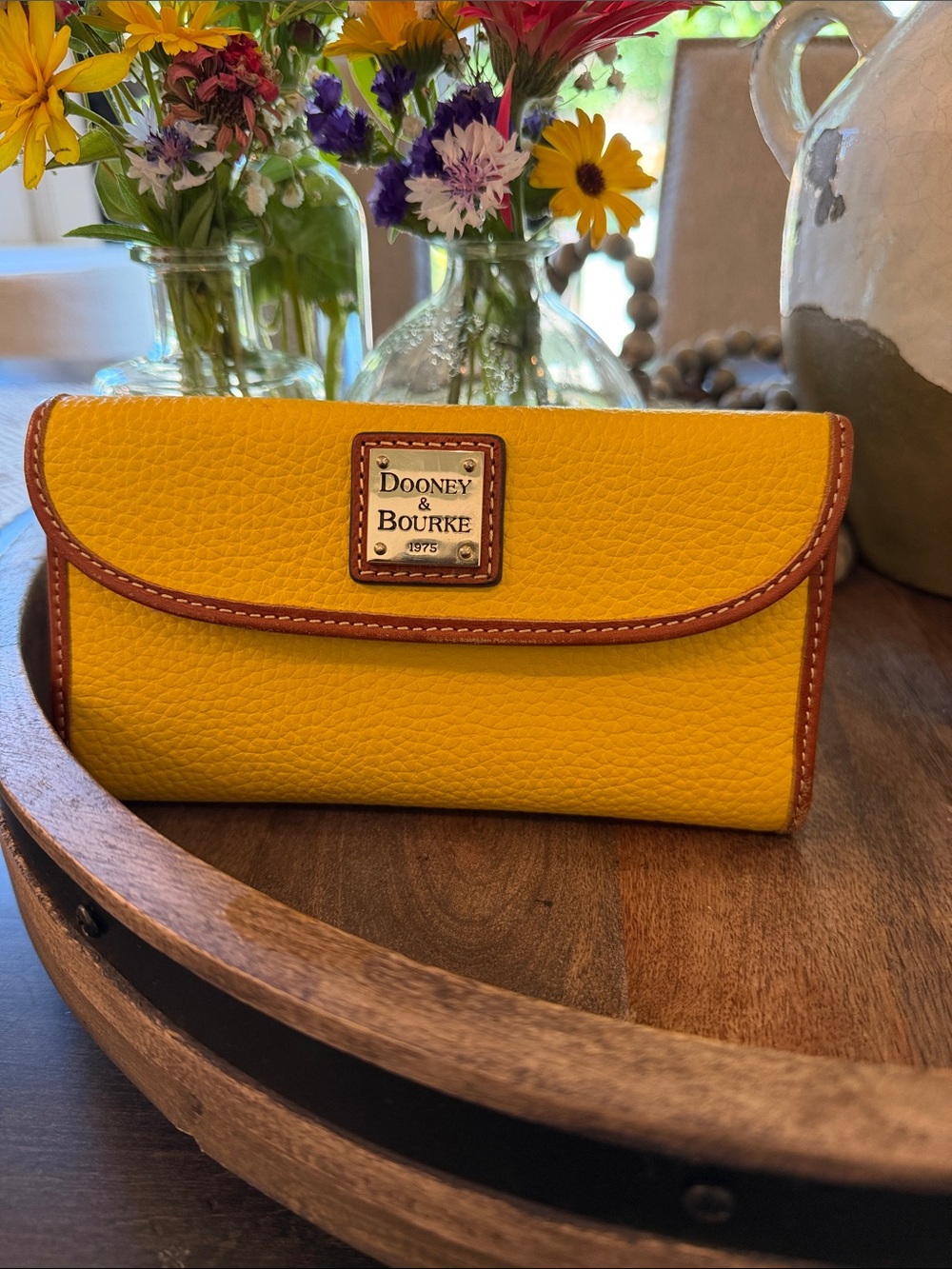 Dooney & Bourke Yellow Pebbled Leather Continental Wallet with Brown Trim